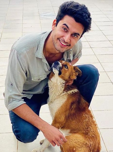 Navneet Malik with a dog