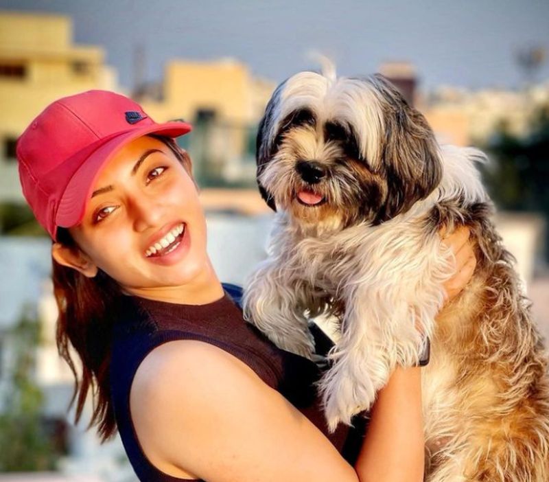 Navya Swamy with her pet dog