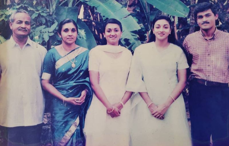 Nitha (second from right) with her family