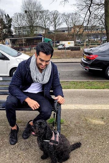 Omer Shahzad with a dog