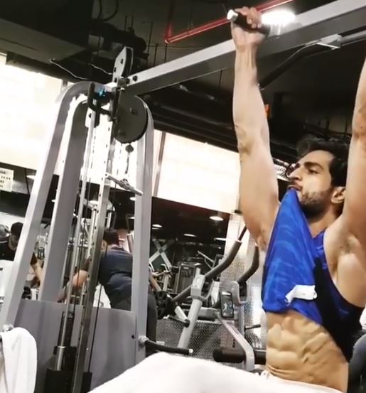 Omer Shahzad working out at a gym