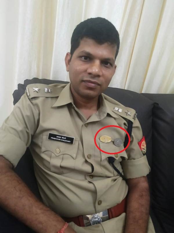 Prabhakar Chaudhary's photo in his uniform wearing the medals he received for his service