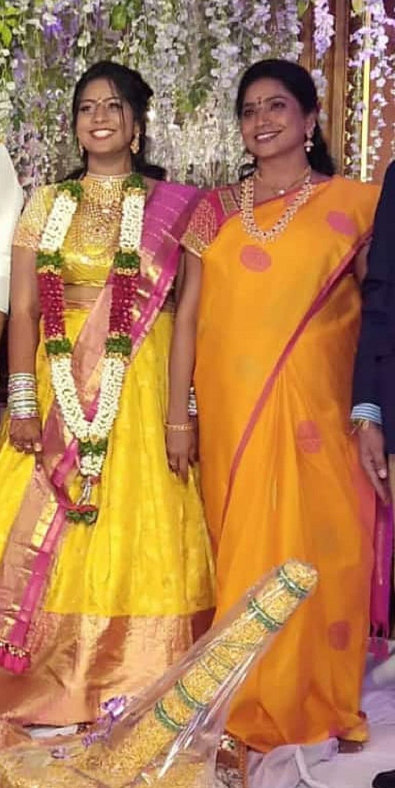 Rekha Naik with her daughter (left)