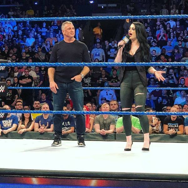 Saraya Bevis aka Paige with Shane McMahon, when she became the General Manager of SmackDown