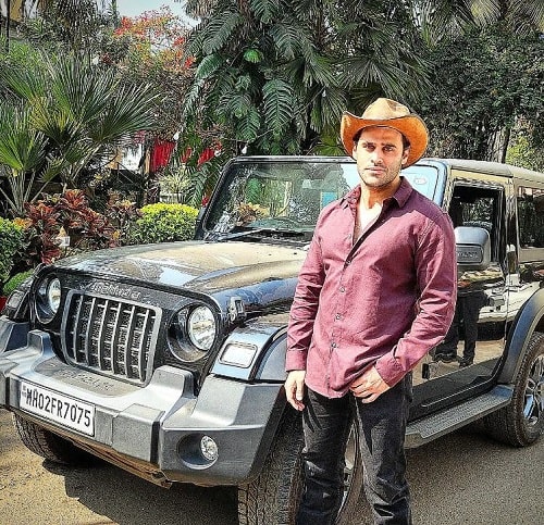 Siddhant Issar posing with his Thar