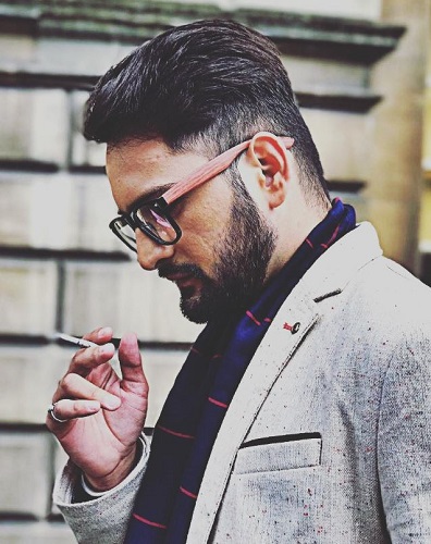Siddharth Chandekar smoking a cigarette