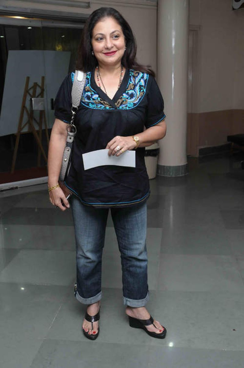 Smita Jayakar standing