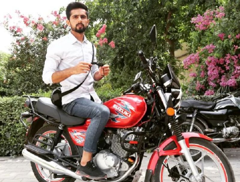 Sohaib Chaudhry posing with his bike