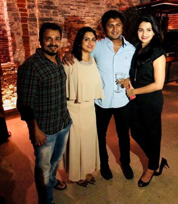 Spandana Vijay Raghavendra with her husband, Vijay Raghavendra (extreme left), brother, Rakshith Shivaram (second from right), and sister-in-law, Anvika Rakshith (extreme right)