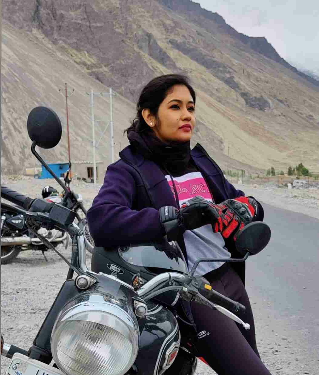 Sruthi Shanmuga Priya with her Royal Enfield Bullet motorcycle