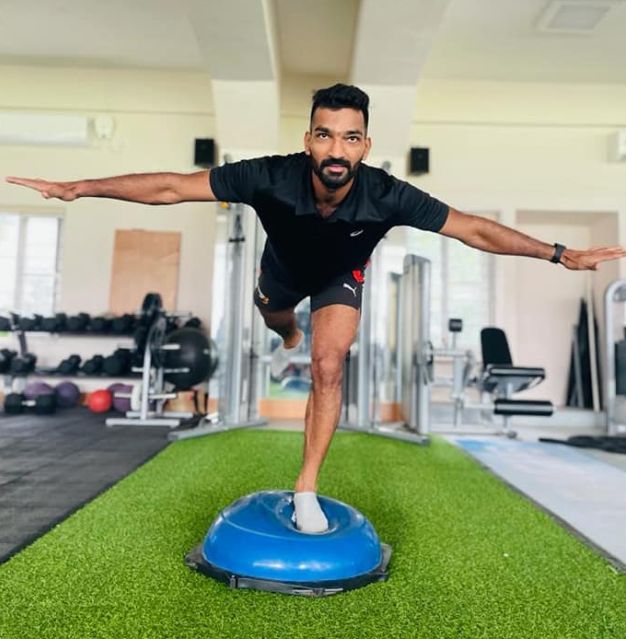 Sukesh working out in the gym