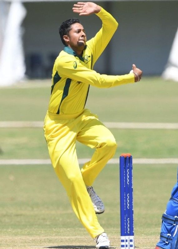 Tanveer Sangha bowling in match for Australia Under-19