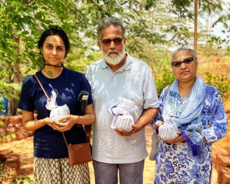 Tushar Gandhi with his wife and daughter