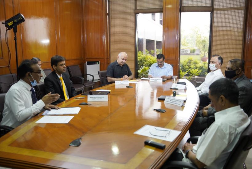 Udit Prakash Rai attending a meeting as a director of Education