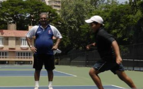 Vece Paes while instructing his students