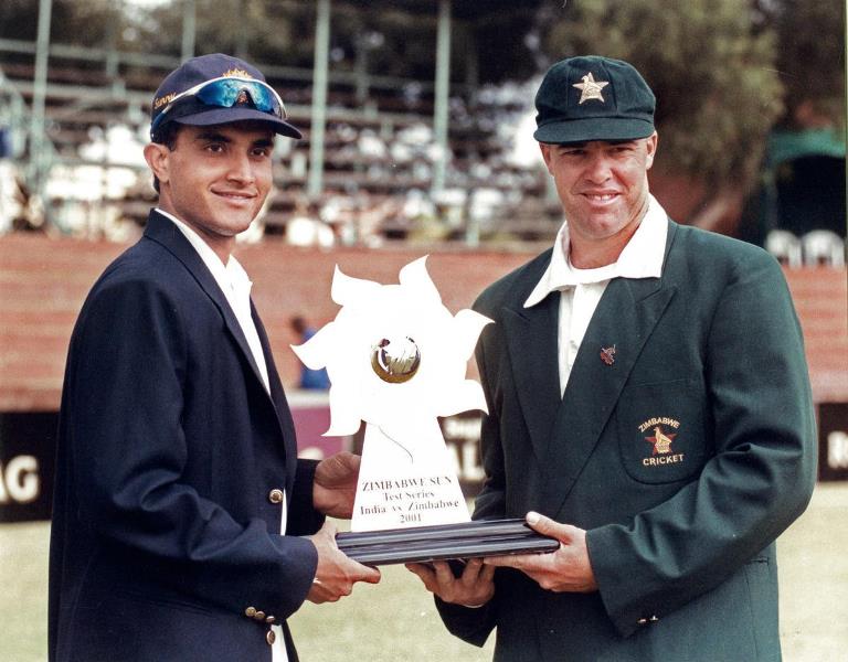 Zimbabwe cricket team captain Heath Streak posing with former India captain Sourav Ganguly with the Sun Trophy ahead of the Test series in Zimbabwe in 2001