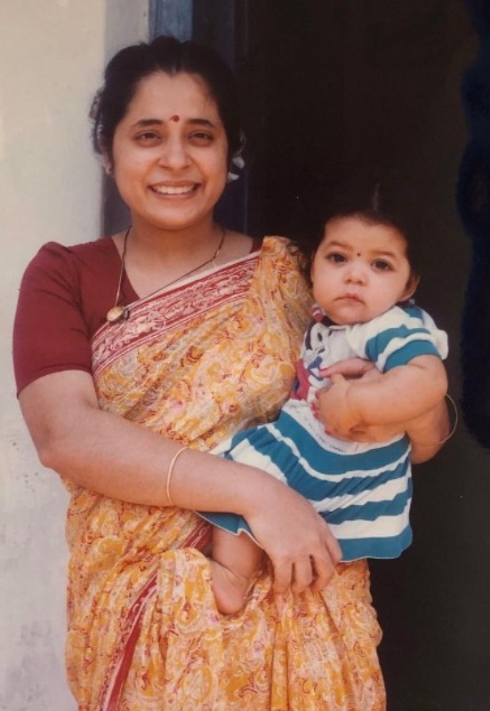 A childhood photo of Damini Bhatla with her mother