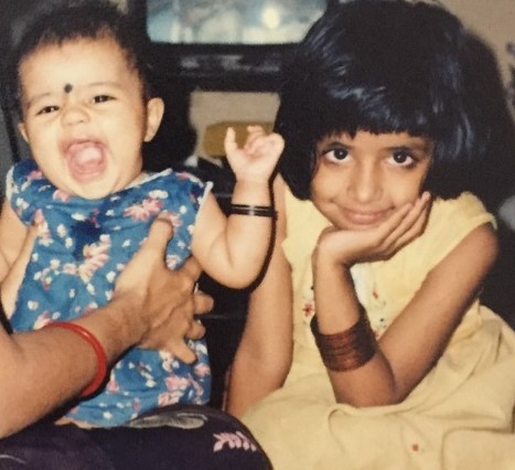A childhood picture of Amritha Aiyer with her sister