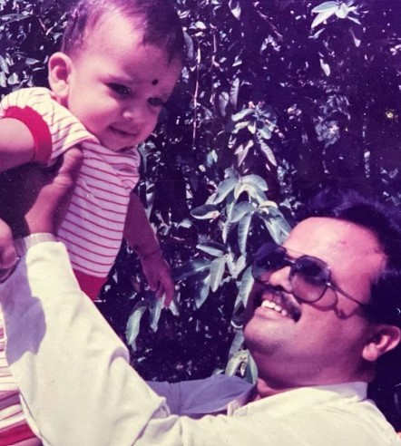 A childhood picture of Ashok Selvan with his father