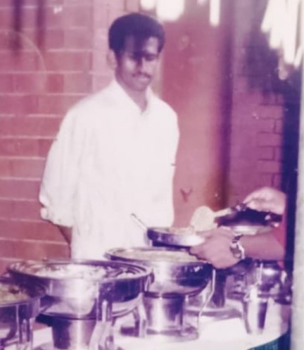 A young Suresh Pillai working as a caterer