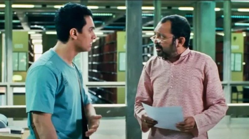 Akhil Mishra with Aamir Khan in a still from the 2009 Hindi film '3 idiots'