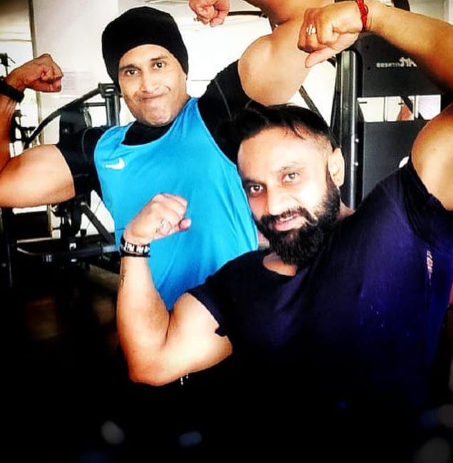 Anand Narasimhan posing after a workout with his personal trainer