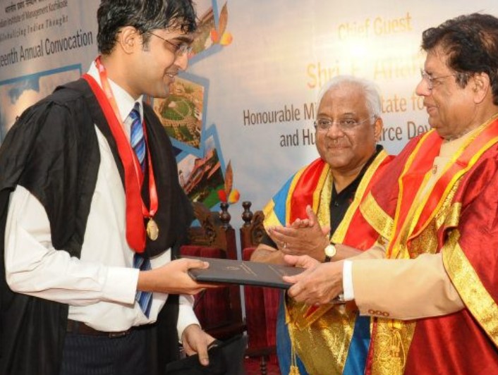 Arjun Mohan while receiving a gold medal