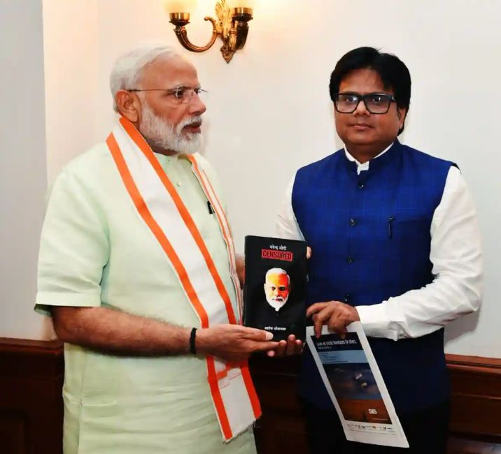Ashok Shrivastav presenting his book Narendra Modi UNCENSORED to Prime Minister Narendra Modi