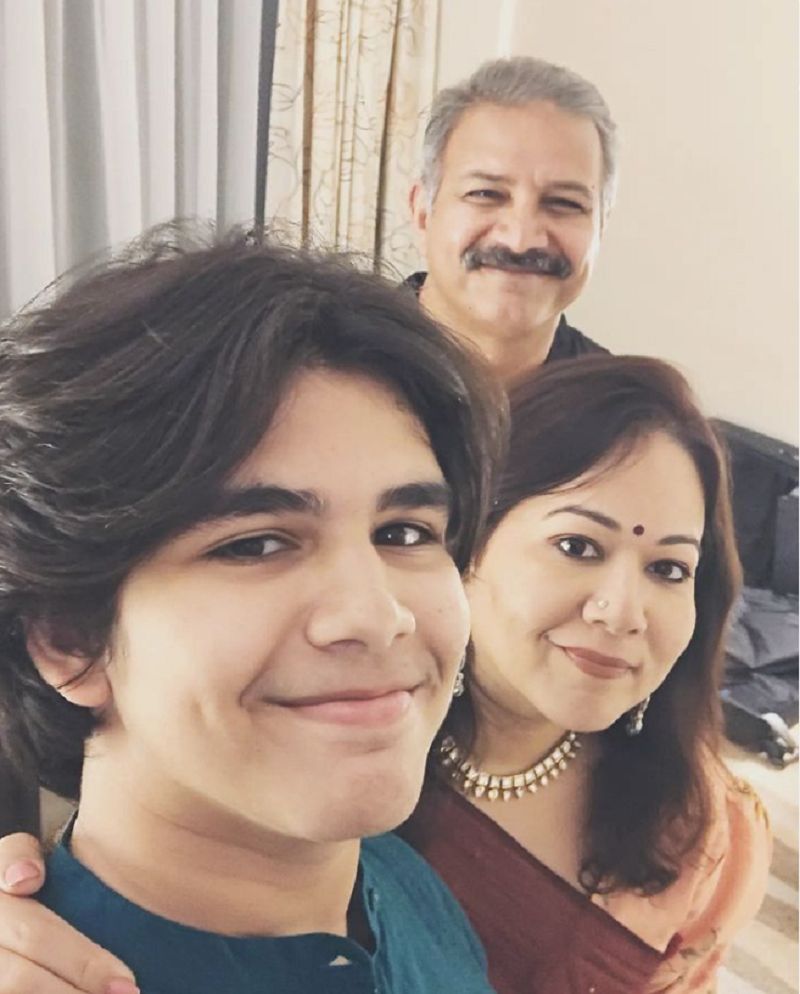Ayesha Raza Mishra with her husband and son