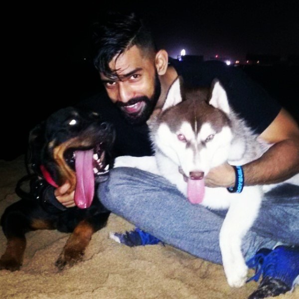 Bharat Raj with his pet dogs