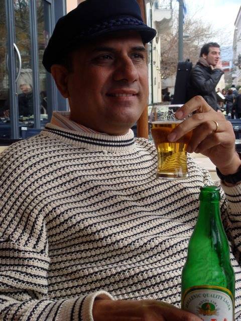 Boman Irani drinking beer on a vacation