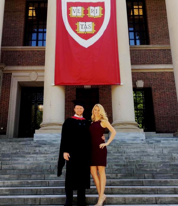 Dan with Tara during his graduation ceremony at Harvard Kennedy School