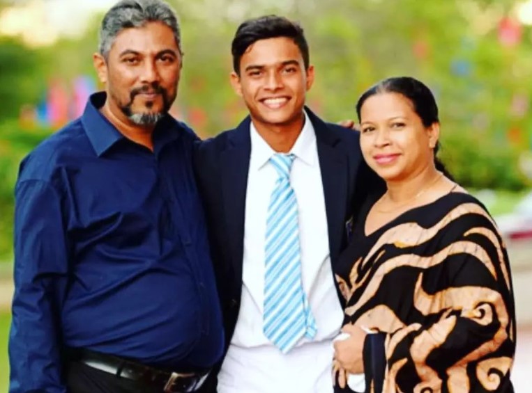Dunith Wellalage with his father, Suranga Niroshan Wellalage, and mother, Harshani Kanchana Wellalage