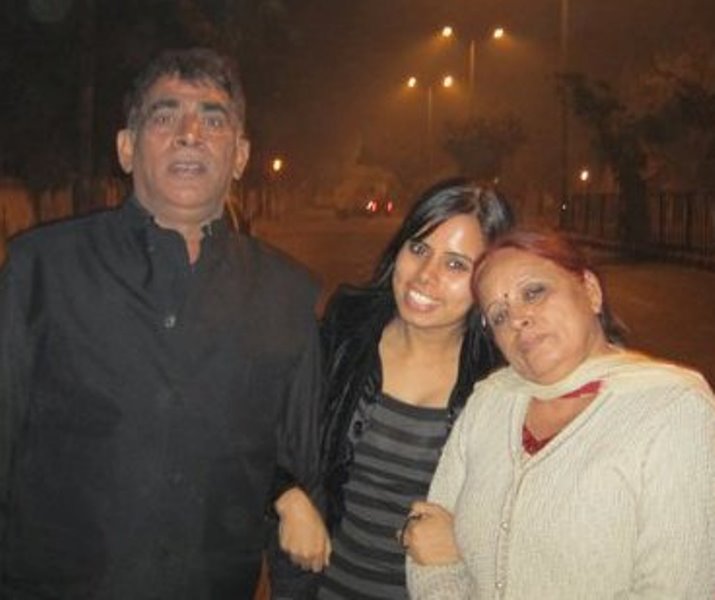 Eenam Gambhir with her parents