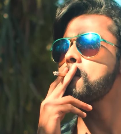 Gautham Krishna while smoking a cigarette