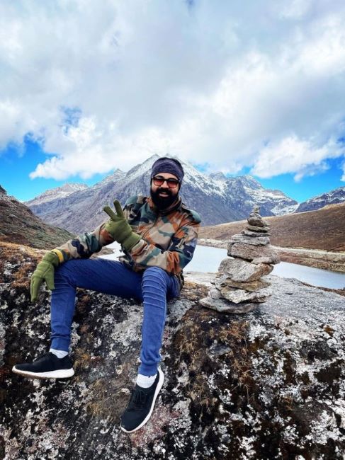 Harikrishnan posing for a photo while he was in Ladakh
