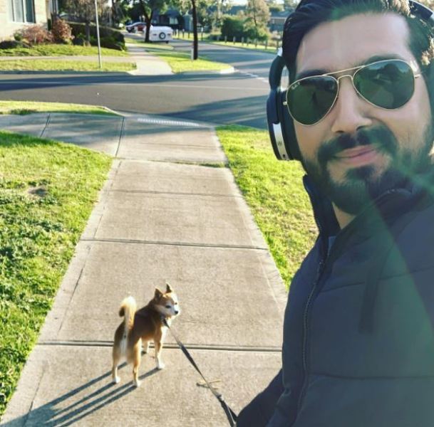 Harris Sultan with his dog, Charlie