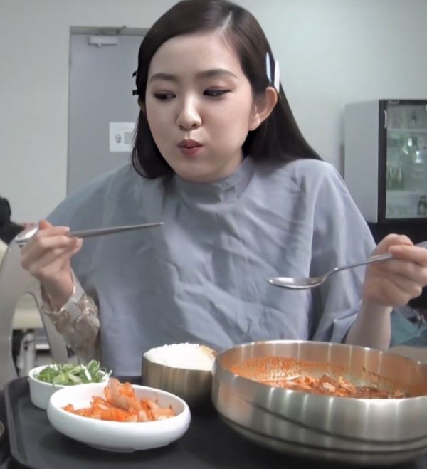 Irene having her non-vegetarian meal