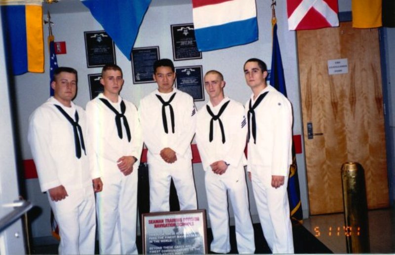 James Suh (in the centre) after completing his training at the Naval Boot Camp