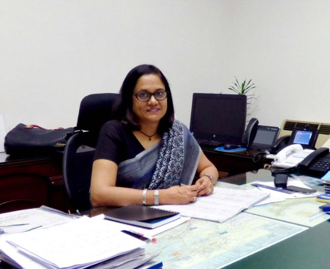 Jaya Verma Sinha working at her office