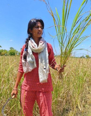 Keerthi Pandian while farming on her fields