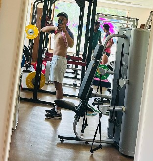 Kunal Rathore while posing at a gym