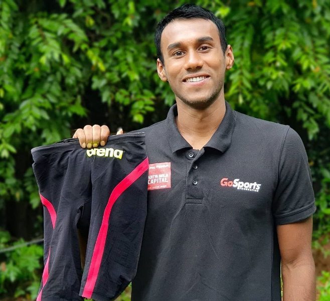 Likith Selvaraj showing his 'FINA World Championship Carbon Flex VX' short which he auctioned to help sports staff during initial Covid-19 lockdown