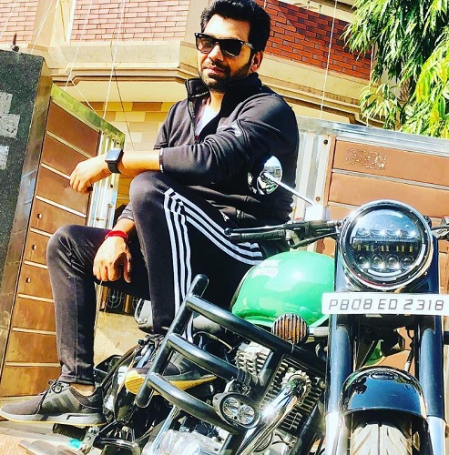 Lucky Singh with his motorcycle