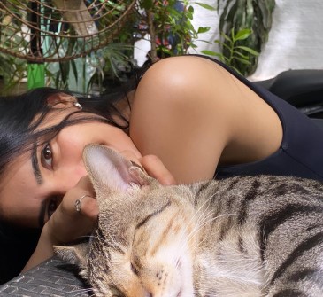 Medha Rana with her pet cat