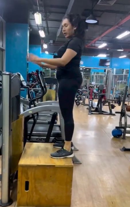Niiniin Kassim working out in the gym