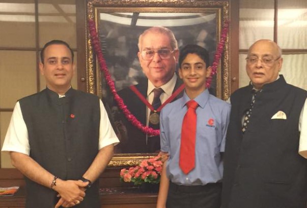 Nikhil Nanda (left) with his father (right) and son (middle)