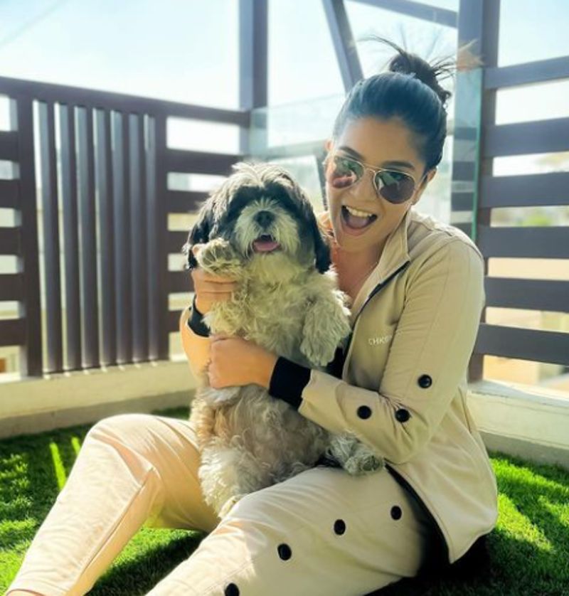 Pooja with her dog