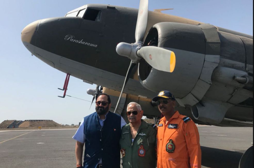 Rajeev Chandrasekhar and his father in front of the aircraft that he gifted to the Indian Air Force
