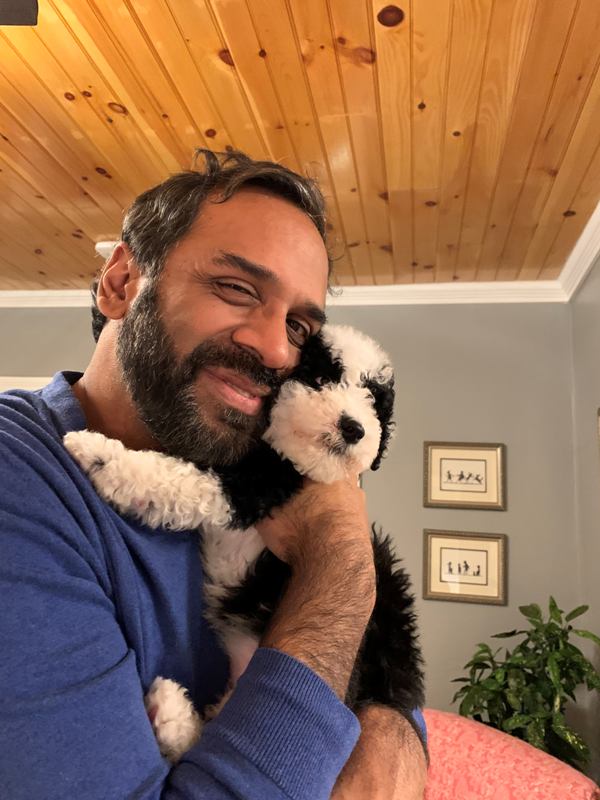 Ravi Shankar with his dog Rishi at his home in Rhode Island